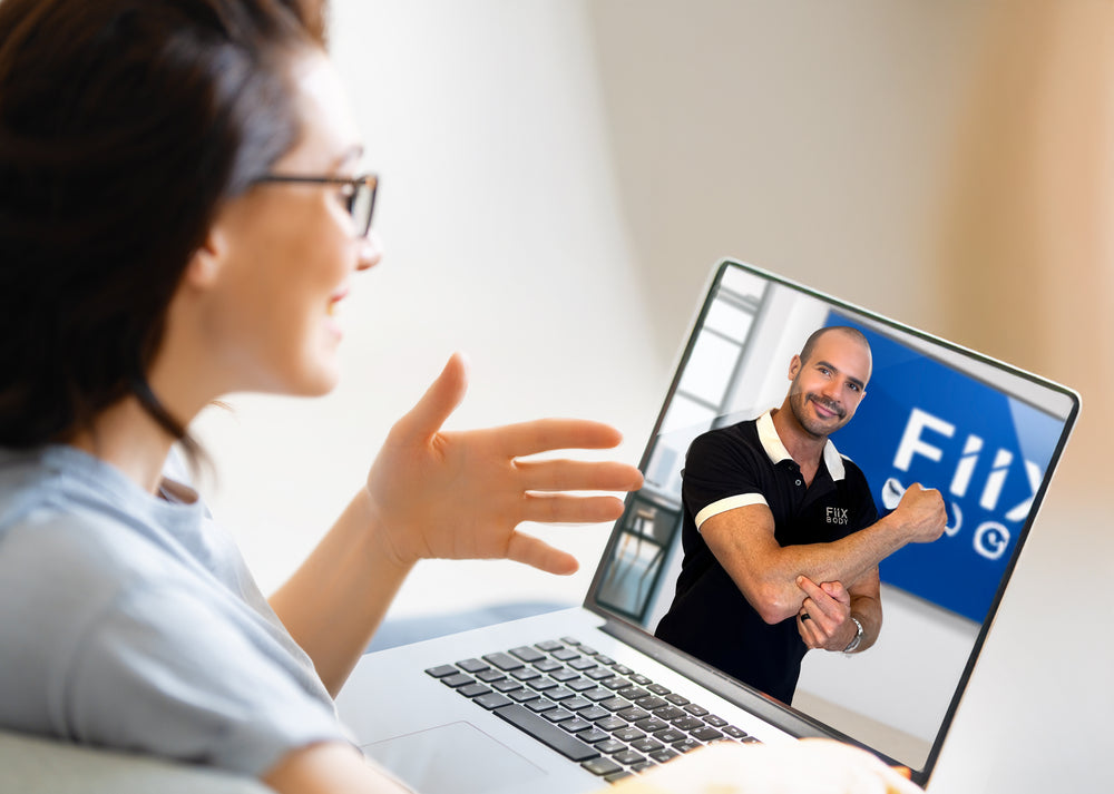 A Fiix elbow coach on a video call with a customer